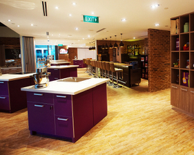 CulinaryOn event venue for rent. Located above Raffles Place MRT station, this cooking studio hosts up to 200 pax at affordable rental rates.